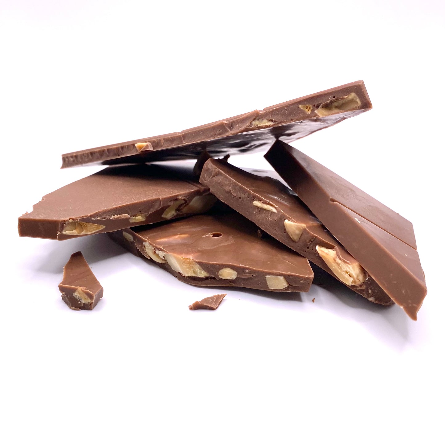 The Milk Chocolate with Toasted Almonds broken up into pieces and stacked up.