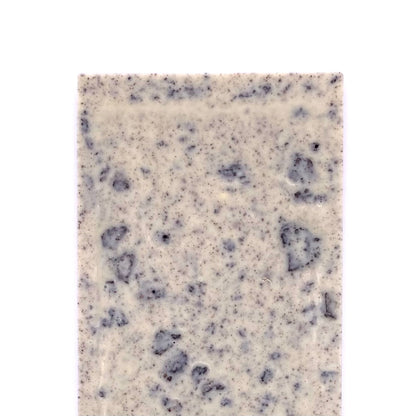 The back side of the Cookies and Cream bar. You can see the chunks off cookies.