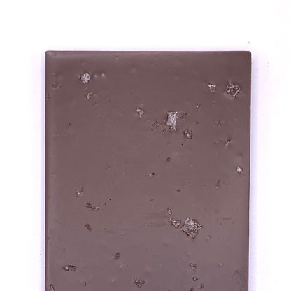 The back of the Dark Chocolate with Sea Salt bar, you can see the sea salt crystals in the bar.